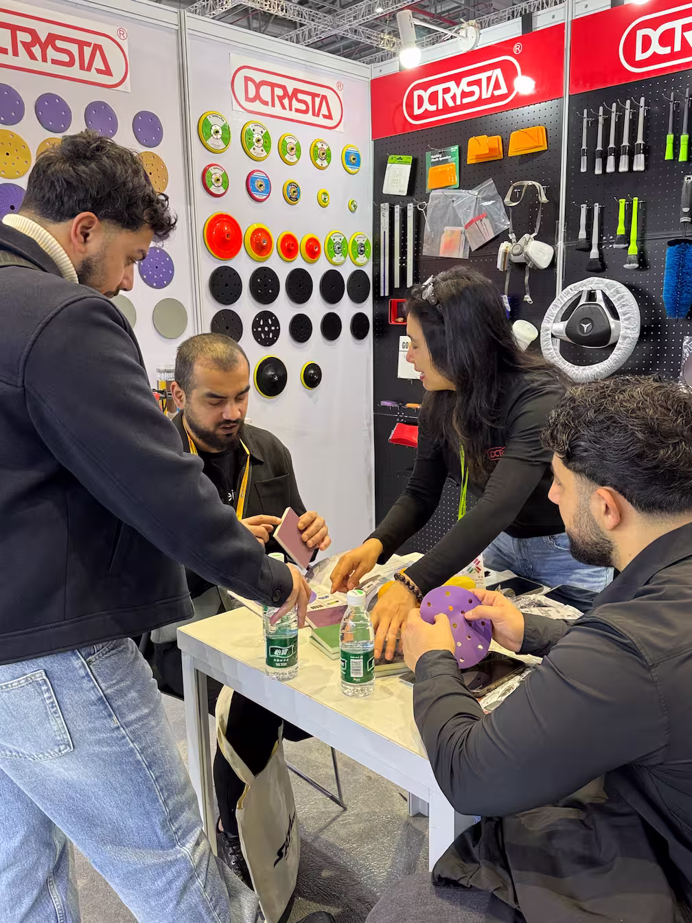 Team and customer interaction at the exhibition booth 01